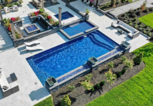 Aerial view of luxury backyard pool and patio