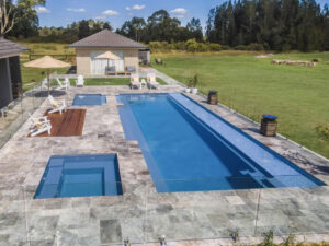 Modern backyard pool, spa, and lounge patio